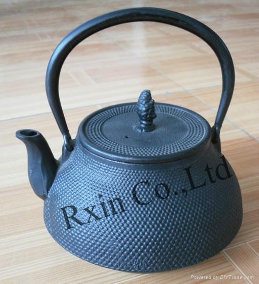 Black hobnail cast iron teapot